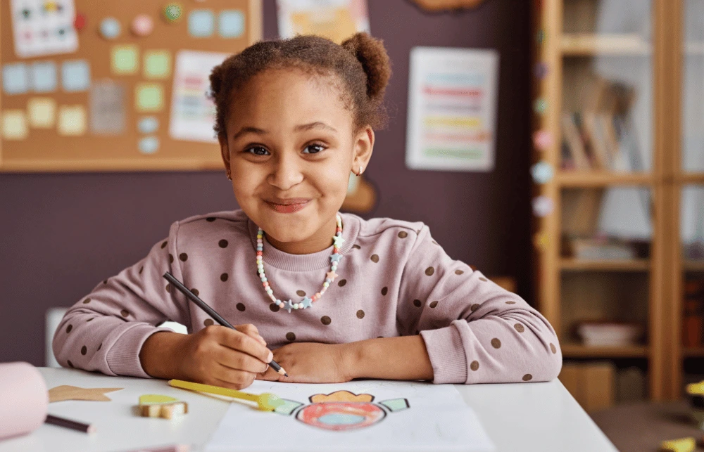 a little girl at school smiling